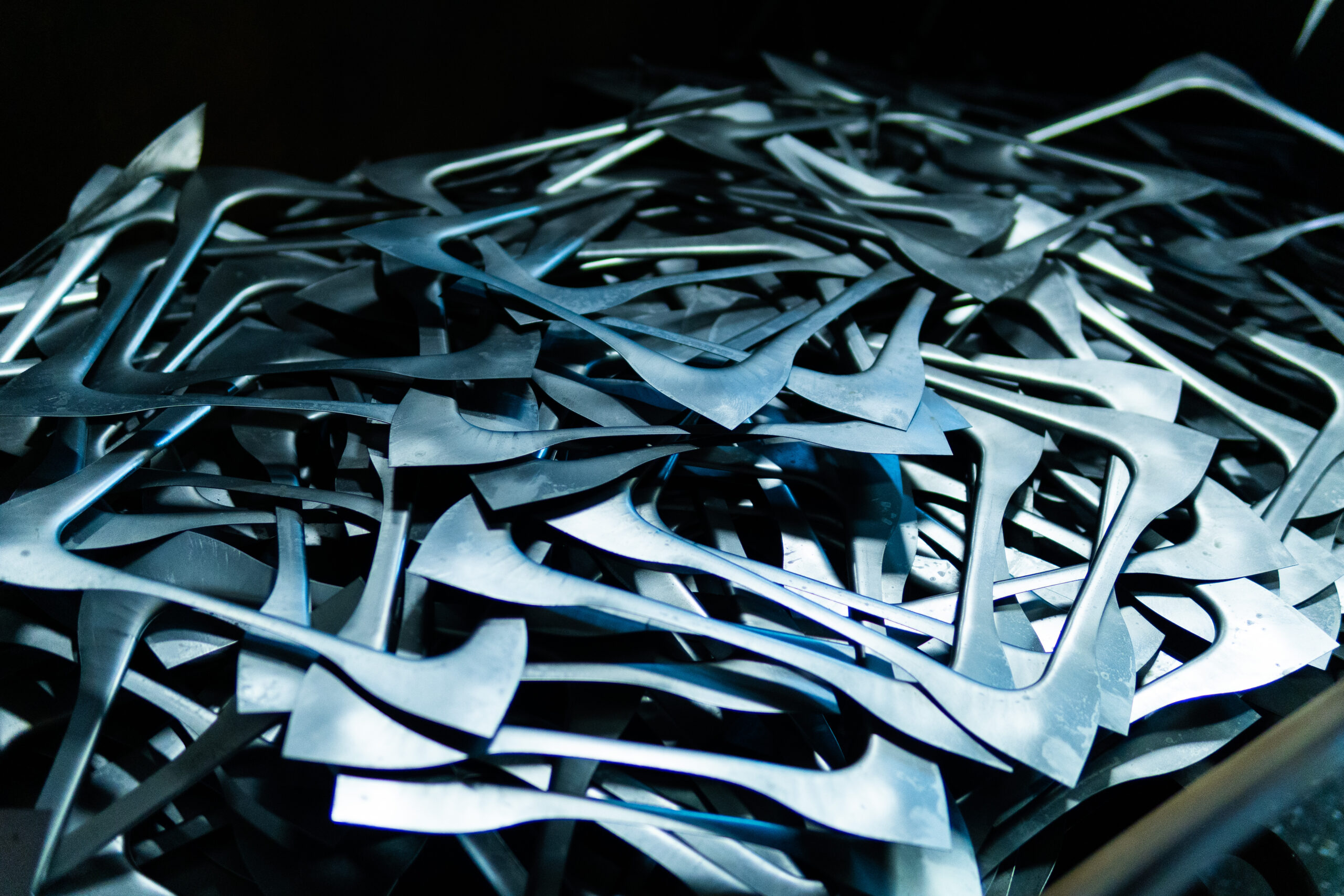 The steel waste,metal pile,stainless steel rubbish,stacked together,prepare for recycle and reused
