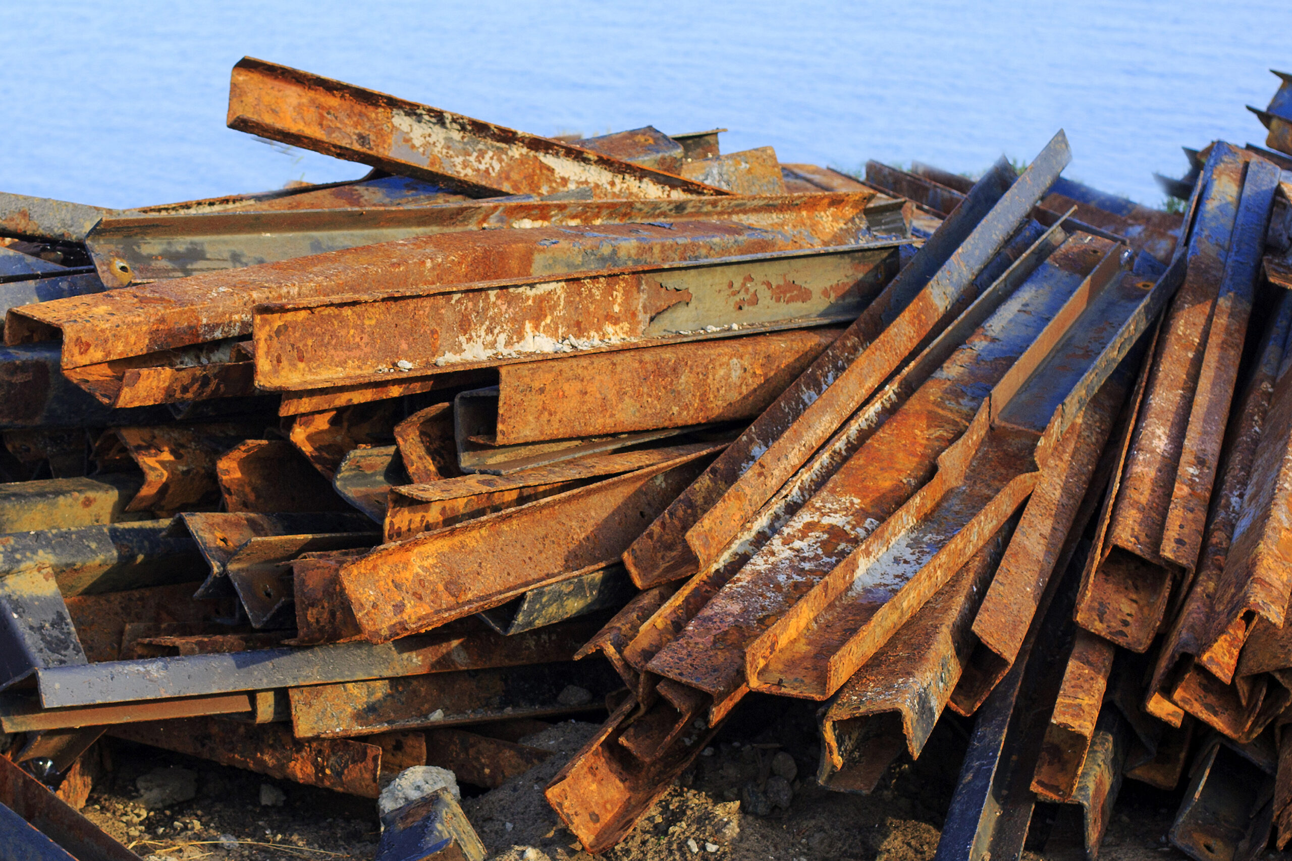 Rusty steel metal bars. Scrap-iron. Concept of scrap metal